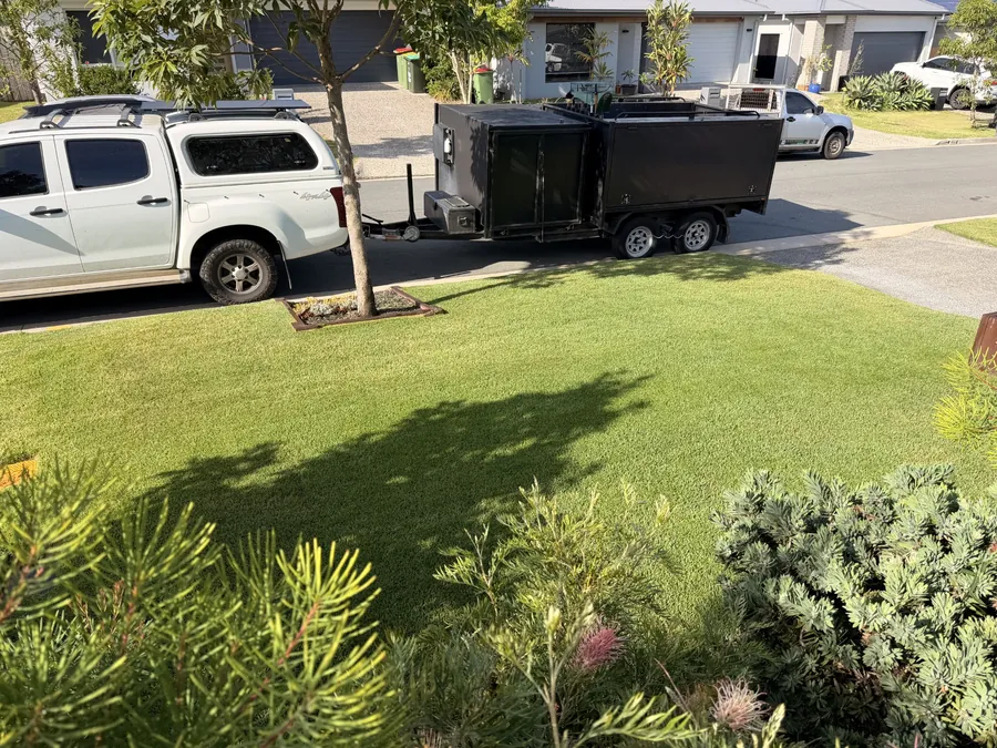 Front lawn mown, ute and trailer kerbside — odd jobs and lawn care, Northern Gold Coast